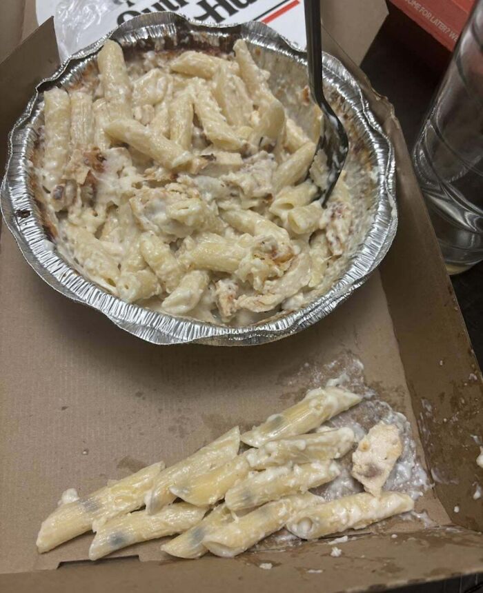 Spoiled pasta dish with mold, creating a disgusting food experience.