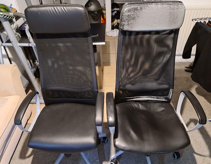 Two identical office chairs showing signs of wear over time, with faded and worn surfaces.