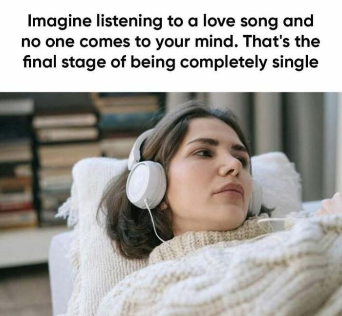 Woman with headphones reflecting on a 'sadcastic' meme about singlehood and music.