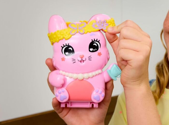Pink cat toy with decorative accessories, perfect Easter basket stuffer for kids.