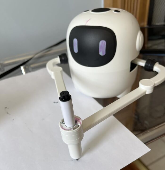 Cute robot drawing on paper, adding fun to Easter basket stuffers.