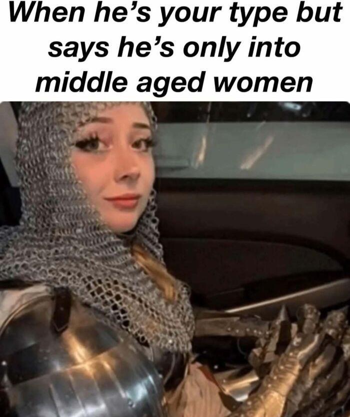 Woman in chainmail armor, smiling in a car, text above with humorous context about liking middle-aged women; daily humor memes.