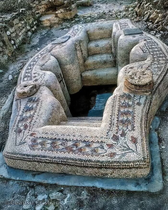 Ancient mosaic bath remains, showcasing historical artistry and architecture from thousands of years ago.
