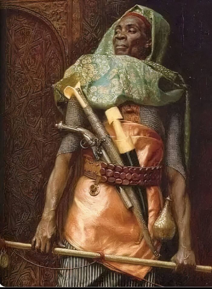 A warrior in ancient attire, holding a sword and staff, showcasing ancient history's rich cultural heritage.