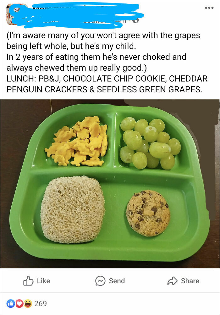 A lunch tray with uncut grapes, cheddar crackers, a circular PB&J sandwich, and a chocolate chip cookie from a mom group post.