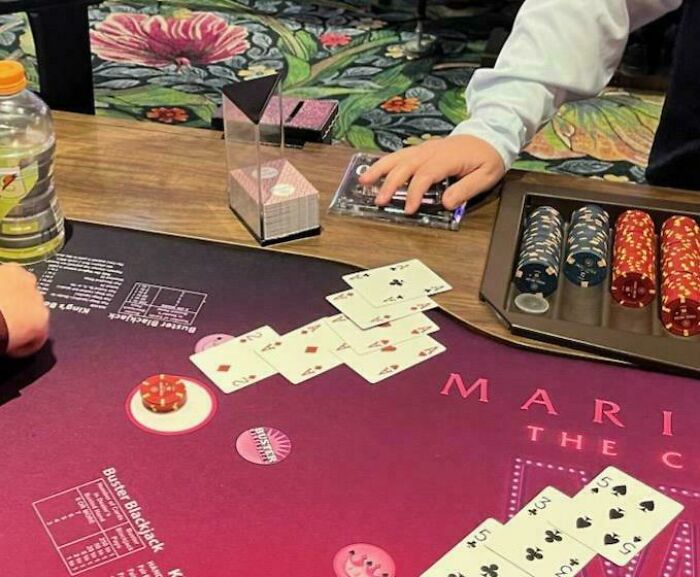 Poker table with cards and chips, capturing an unbelievable hand to prove the moment.
