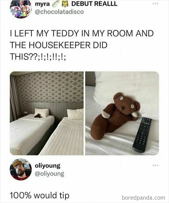 Teddy bear humor with funny pose in a hotel room, holding a TV remote on a neatly made bed.