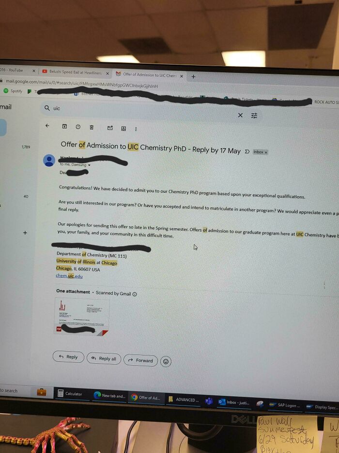 Email notification on a computer screen displaying an admission offer to UIC Chemistry PhD program; a bright spot in a rough day.