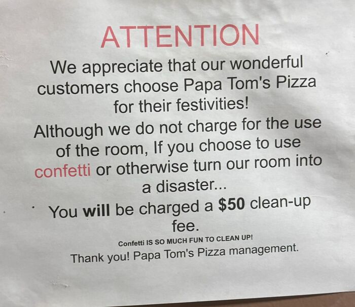 Sign warning customers about a $50 clean-up fee for using confetti at Papa Tom's Pizza festivities.