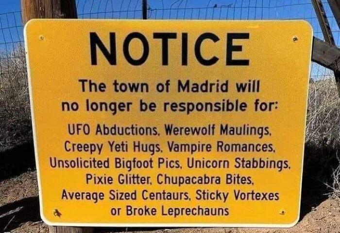 Notice sign listing humorous consequences in Madrid; mentions UFOs, werewolves, unicorns, and more as big mistake aftermath.