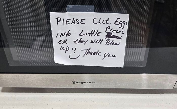 Microwave with a note warning to cut eggs into pieces to prevent them from exploding.