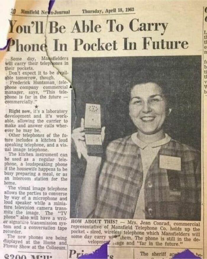 1963 newspaper article about future pocket-sized phones, with a smiling woman holding a prototype. Keywords: America, JFK years.