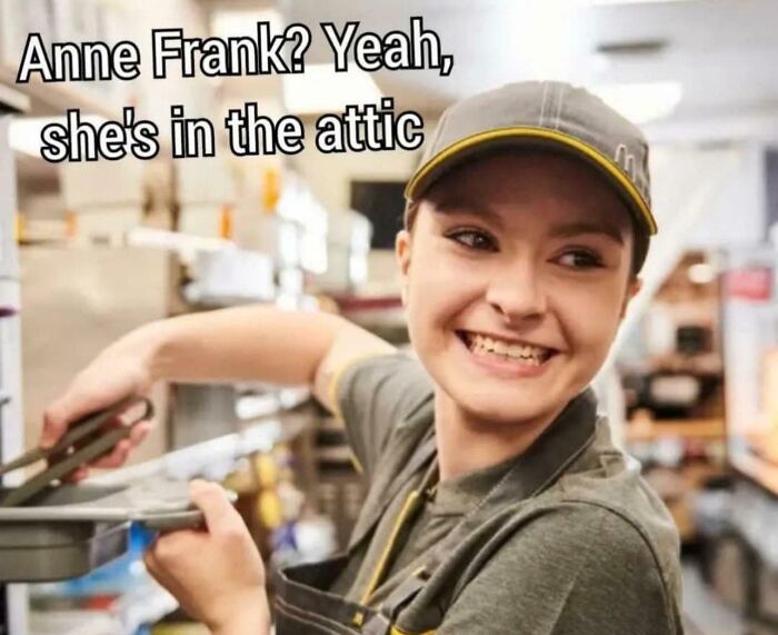 Smiling fast-food worker with text referencing Anne Frank, illustrating a meme explanation.