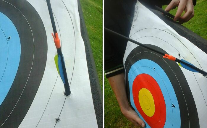 Arrow piercing another arrow on a target, showcasing an incredible shot people wouldn't believe without a photo.