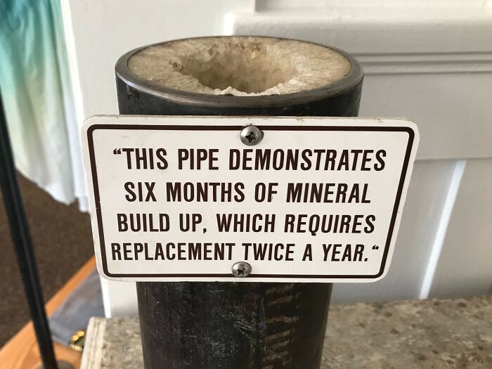 Pipe with mineral buildup over six months, showcasing effects of time and use.