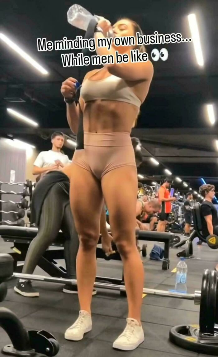 Woman in gym drinking water, text overlay about minding her business, with men reacting, embodying cringe behavior.