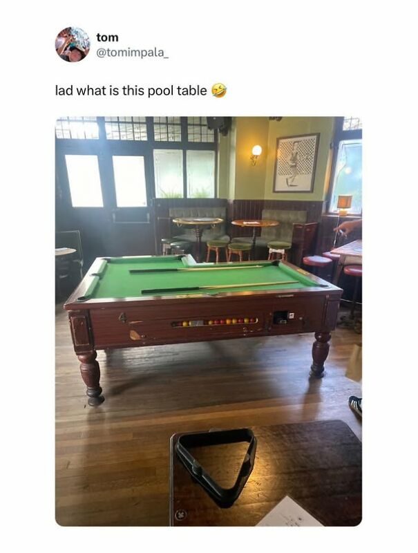Humorous tweet featuring a pool table with half the surface missing, highlighting Scots’ sense of humor.