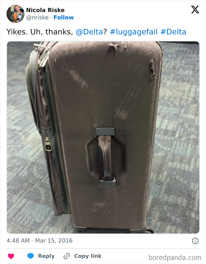 Damaged suitcase with ripped fabric at the airport, highlighting an airline baggage fail.
