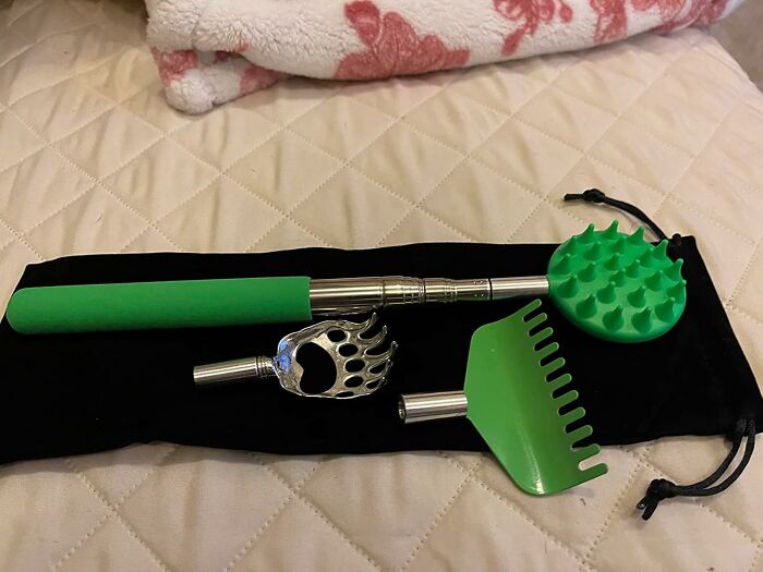 Ultra-specific product tools with green handles on a black pouch, displayed on a quilted surface.