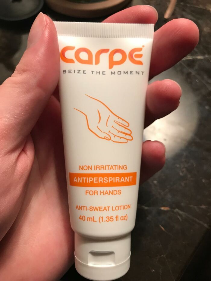 Hand holding a tube of antiperspirant for hands, an item you'd rather have delivered in a plain brown box.