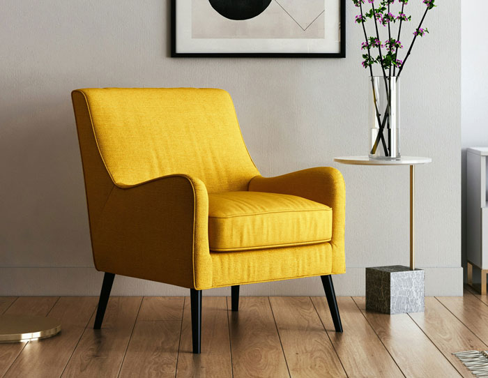 Yellow chair in a modern home setting, a popular place to hide things.