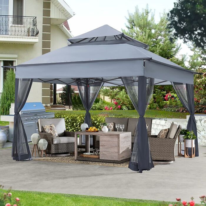 Outdoor patio with gazebo and furniture, a perfect spring must-have for backyard dreams.