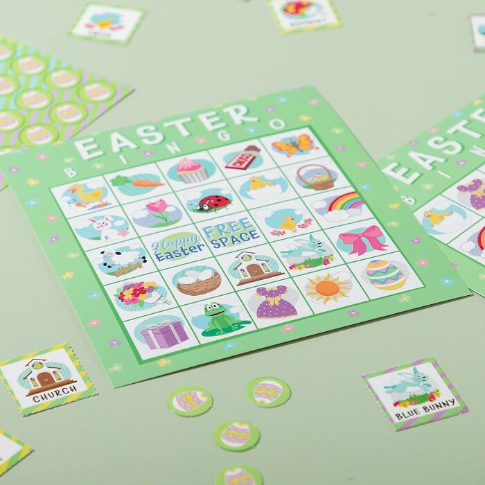 Easter bingo game card on a green background, featuring colorful spring-themed illustrations.