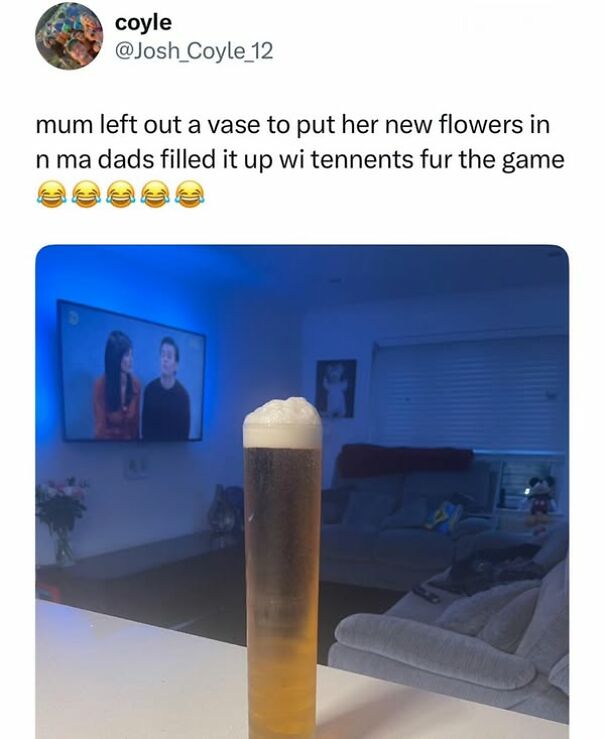 Tall glass filled with Tennents beer in a living room, playful Scottish humor displayed through a funny tweet.