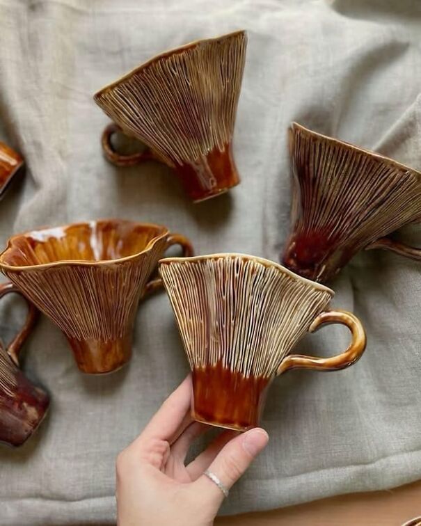 Unusual vintage brown ceramic mugs with a distinctive fluted design found while thrifting.