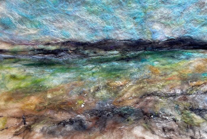 Fiber landscape artwork depicting a colorful, textured scenery by Moy Mackay.