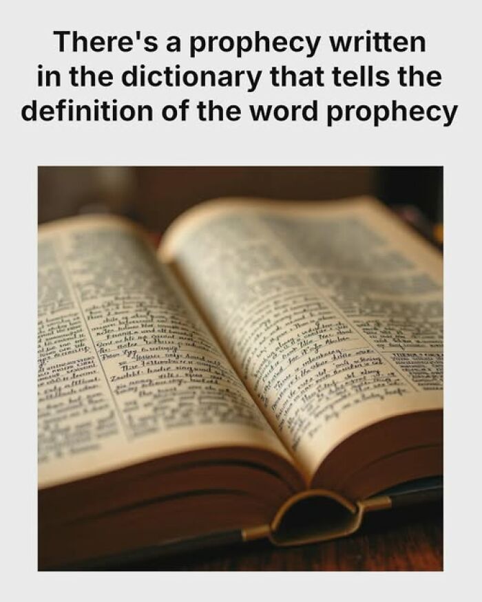 Open dictionary showing text about prophecy, illustrating a literal meme for humorous effect.
