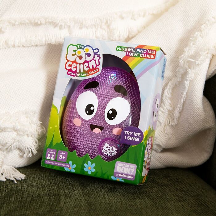 Colorful Easter egg toy packaged in a box with playful design and text, offering an interactive hide-and-seek game option.