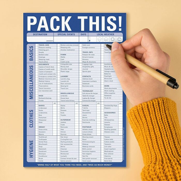 Travel hacks checklist with hand marking items, emphasizing essentials for organized packing.