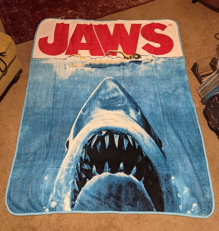 Jaws-themed blanket featuring a shark design, capturing fandom goals.