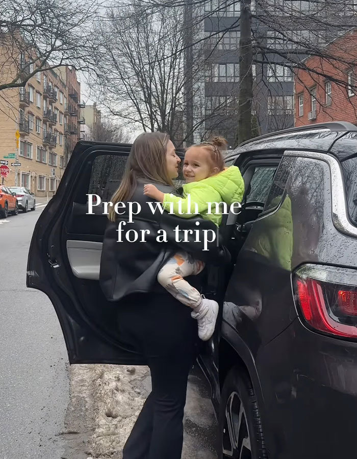 Woman and child preparing for a trip outside a car, related to rent a private jet. Woman and child preparing for a trip outside a car, related to rent a private jet.