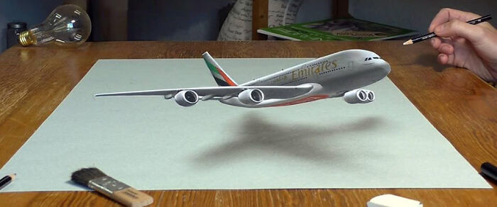 3D drawing of an airplane by a German artist, showing realistic shading and perspective on a flat surface.