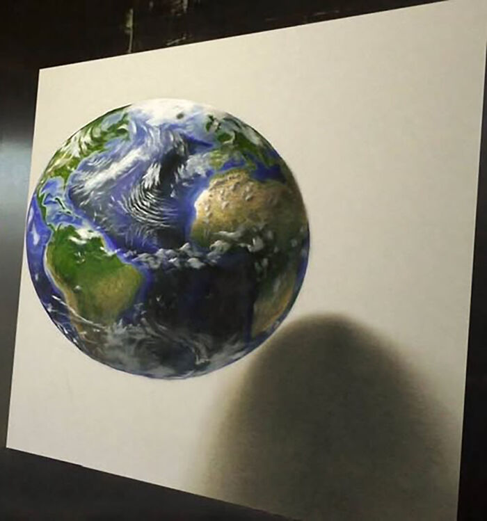 3D drawing of Earth by German artist, showcasing incredible artistic skills and realistic illusions.