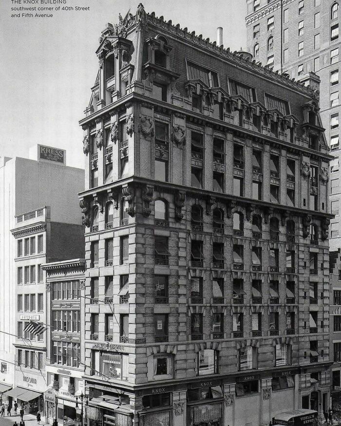 Historic Knox Building showcasing stunning Old American architecture in a bustling city corner.