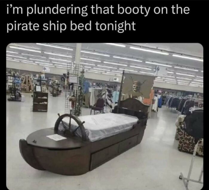 Pirate ship bed in store with humorous text, part of Daily Humor Memes.