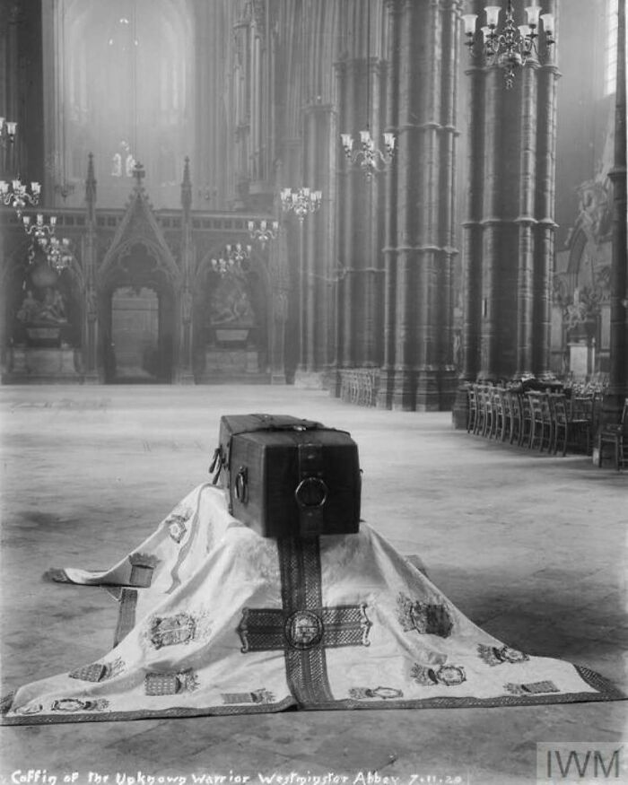 Coffin of the Unknown Warrior inside Westminster Abbey, symbolizing historical significance and remembrance.