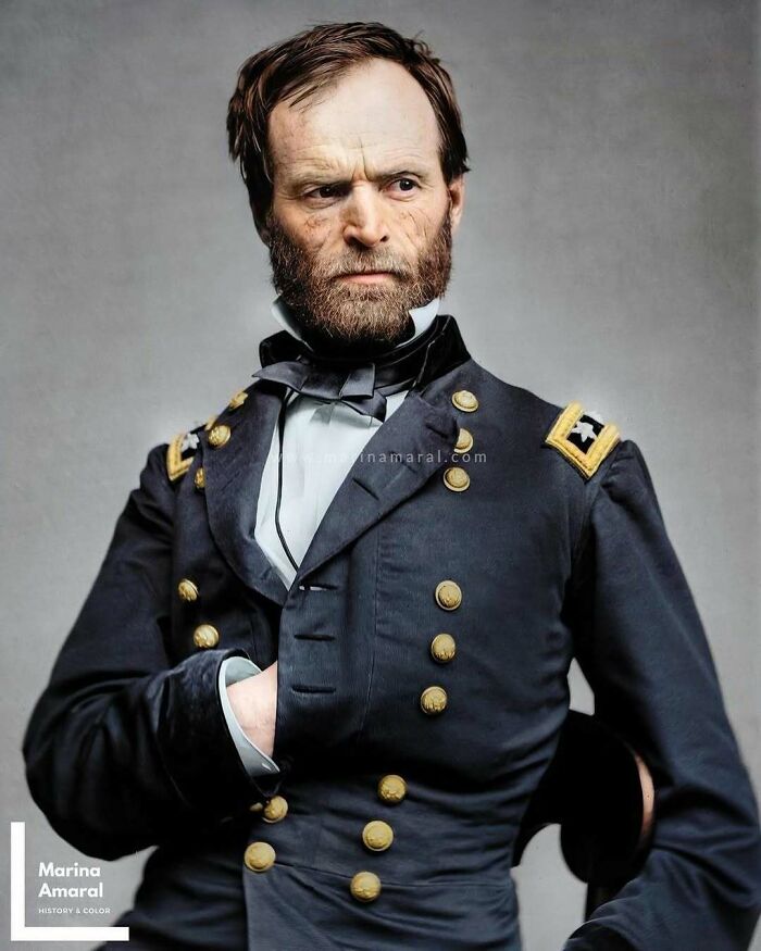 A colorized historical image of a 19th-century military officer in a dark uniform, showing historical fashion.