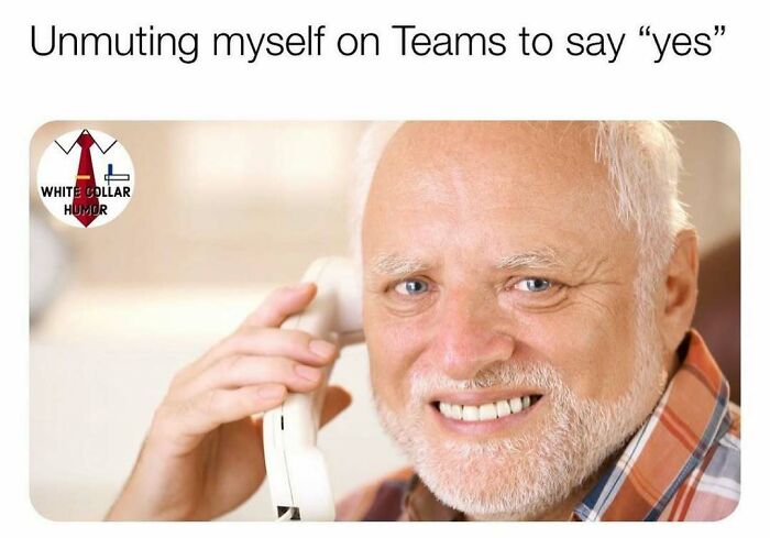 Older man humorously on phone representing work-related humor about unmuting on Teams.