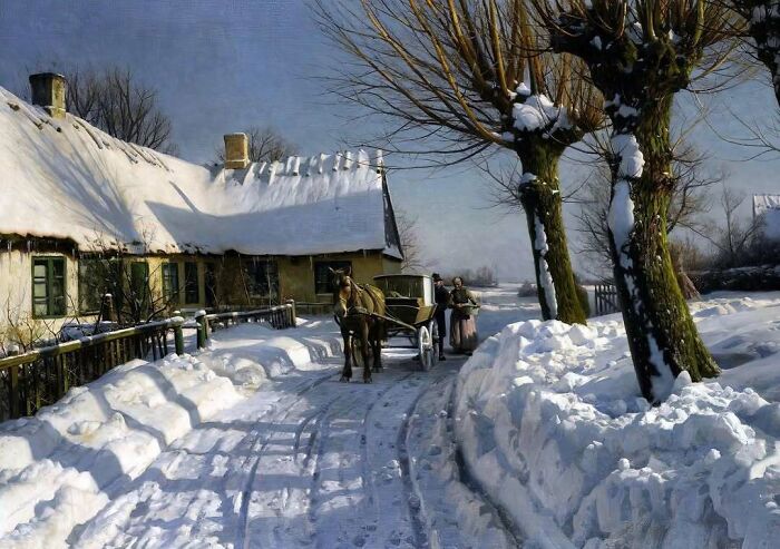 Historical pic of a snowy village road with a horse-drawn cart and cottages, evoking nostalgia.