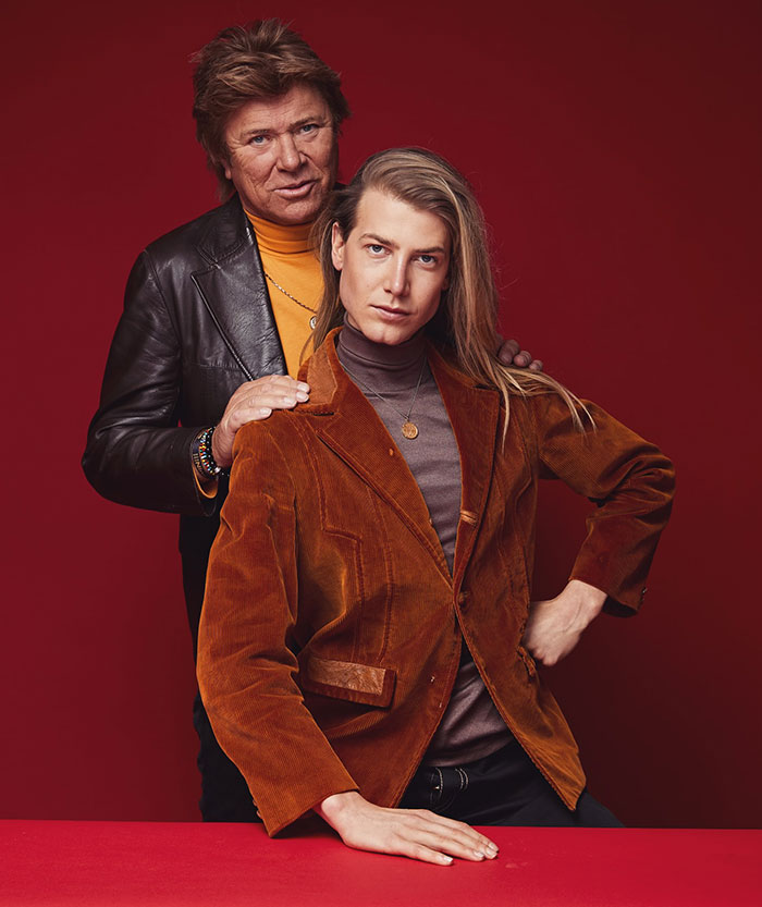 Richard Wilkins' son in a brown jacket poses with him, showcasing a dramatic transformation.