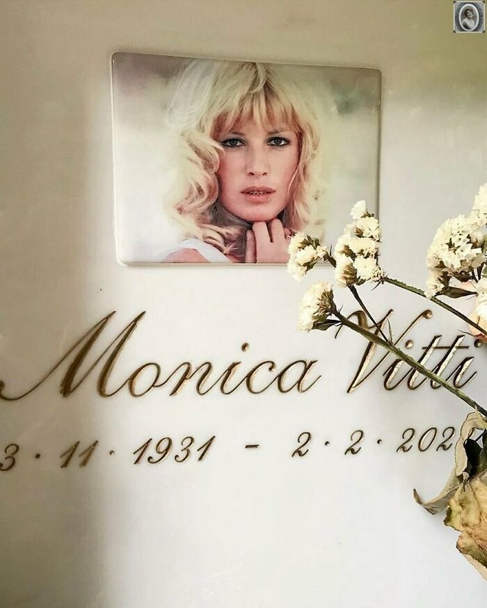 Lovely headstone portrait featuring a woman with flowers in foreground.