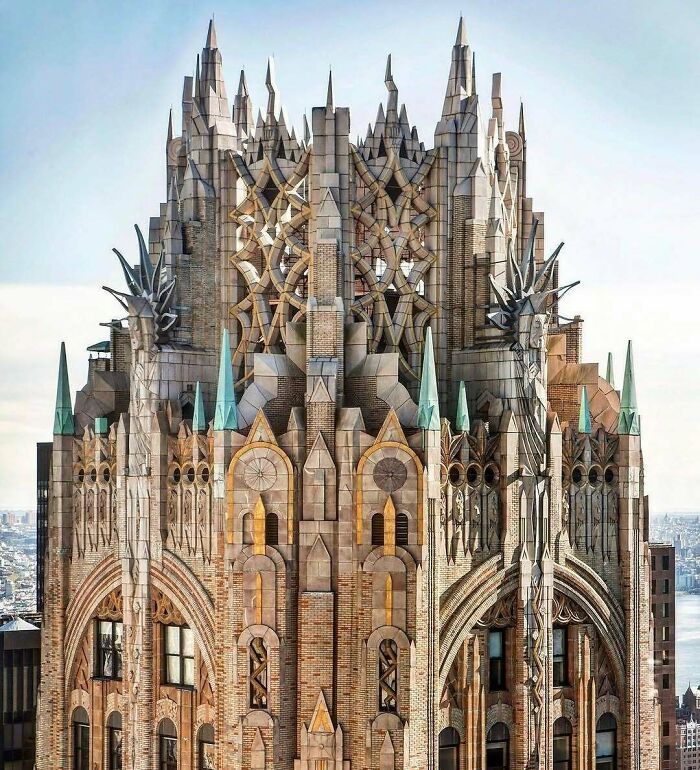Ornate top of a historic American building exemplifying old architecture with intricate details and spires.