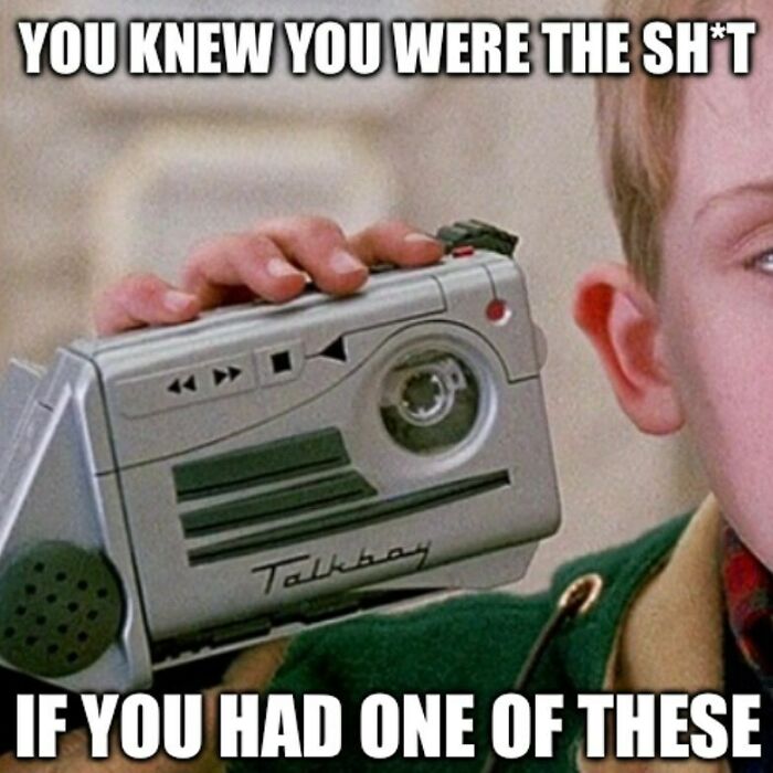 Person holding a vintage Talkboy device, symbolizing funny throwbacks for those familiar with floppy disks.