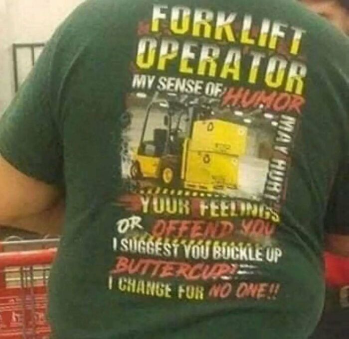 Person wearing a chaotic t-shirt with a humorous forklift operator message.