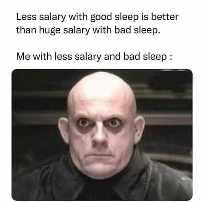 Bald man with dark circles under eyes illustrating introvert meme about salary and sleep.