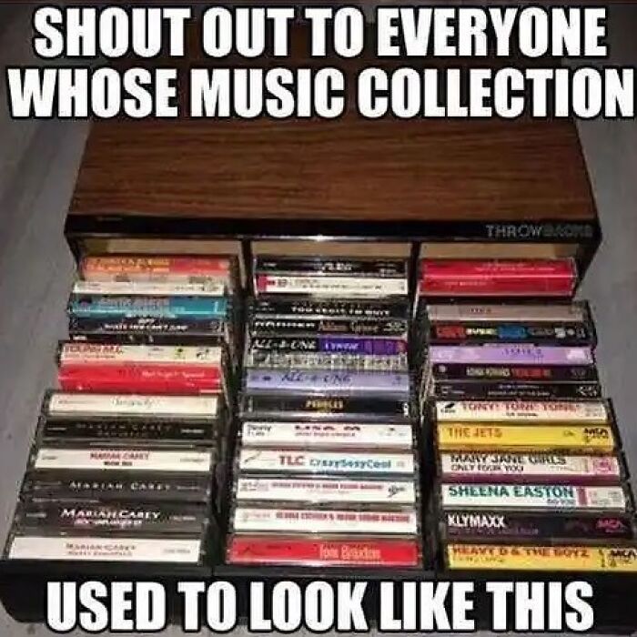 Cassette tapes in a drawer, a classic throwback for those familiar with floppy disks.